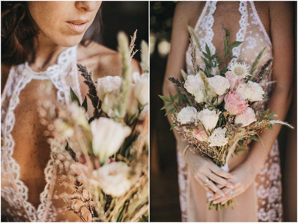 Close-up details of a lace wedding dress and delicate floral bouquet.