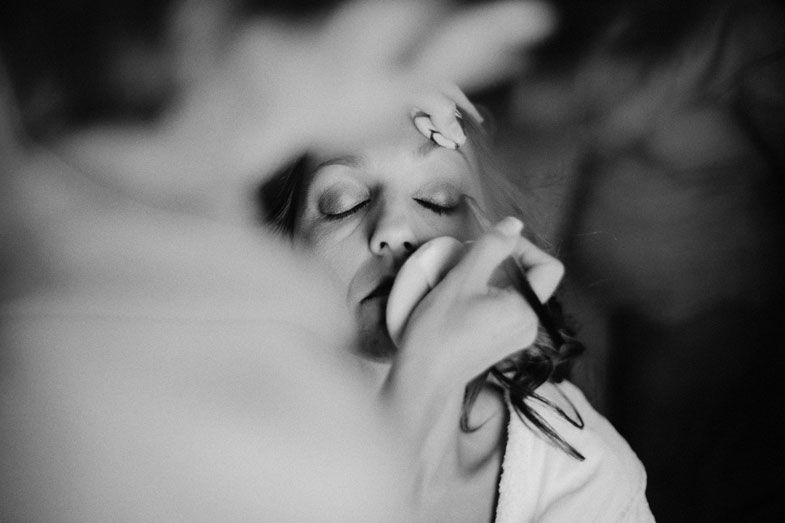 Artistic black and white close-up portrait with soft focus effects.