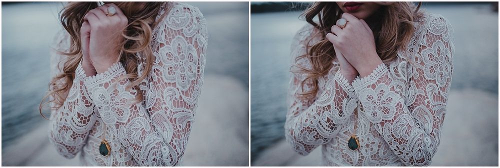 Detail shots of delicate white lace sleeves against a moody coastal backdrop.