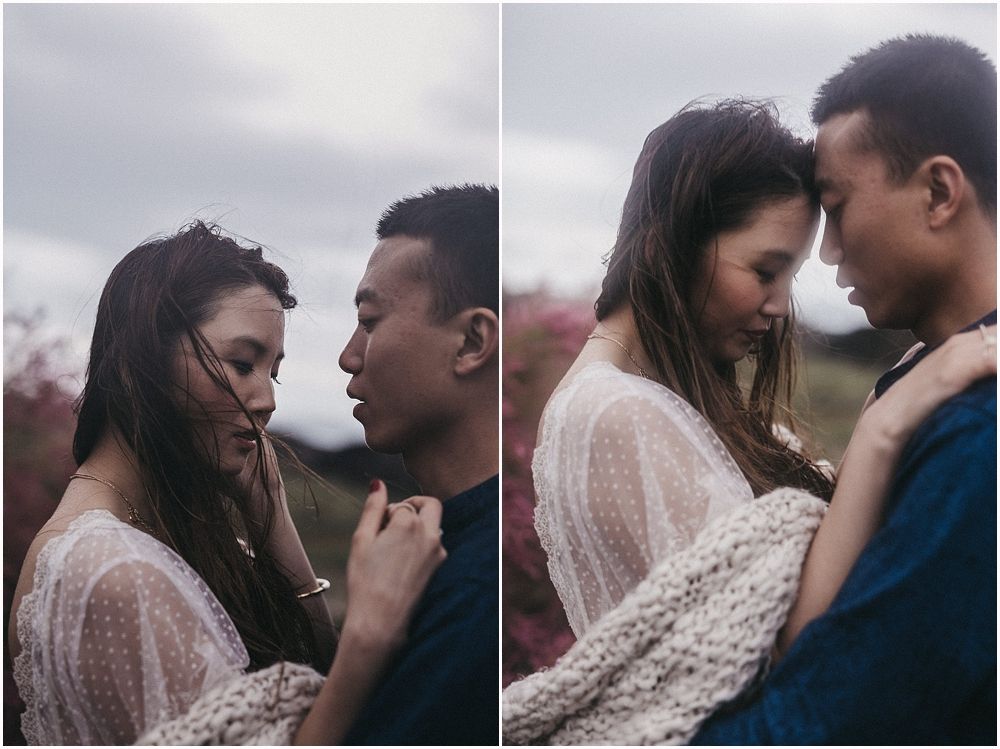 Two intimate photos showing a couple in tender moments against a cloudy sky and natural landscape.