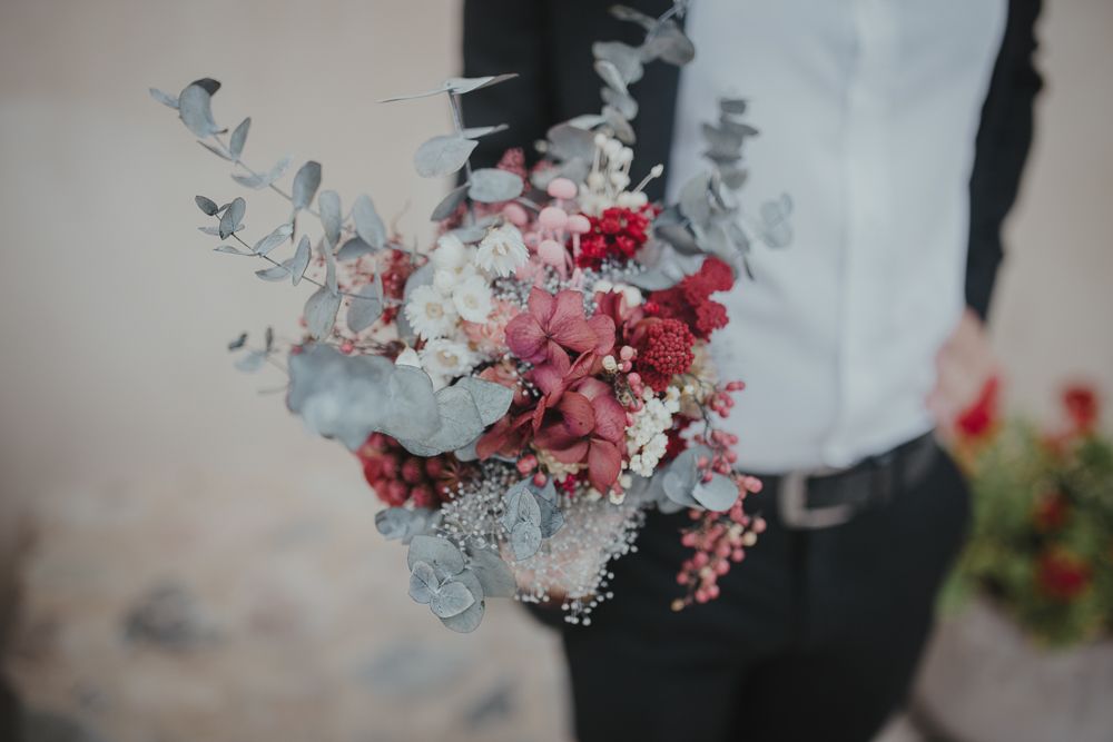 Beautiful bouquet featuring pink and white flowers with eucalyptus leaves.