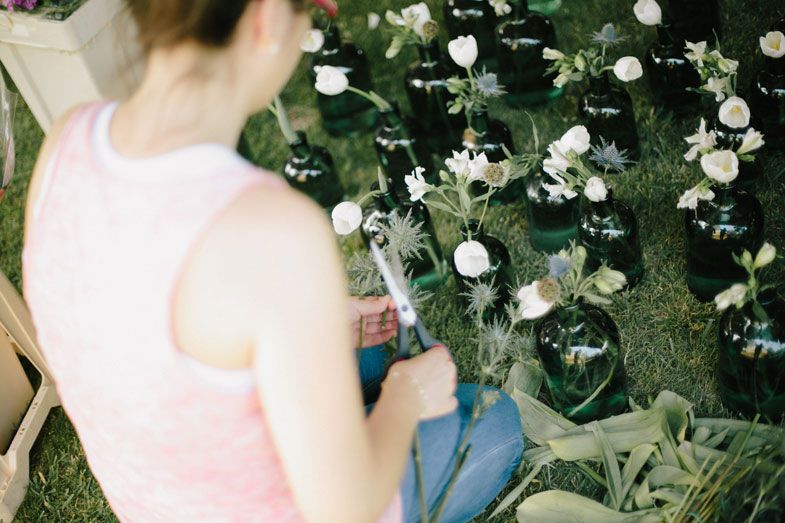 White flowers and greenery in an outdoor garden setting.