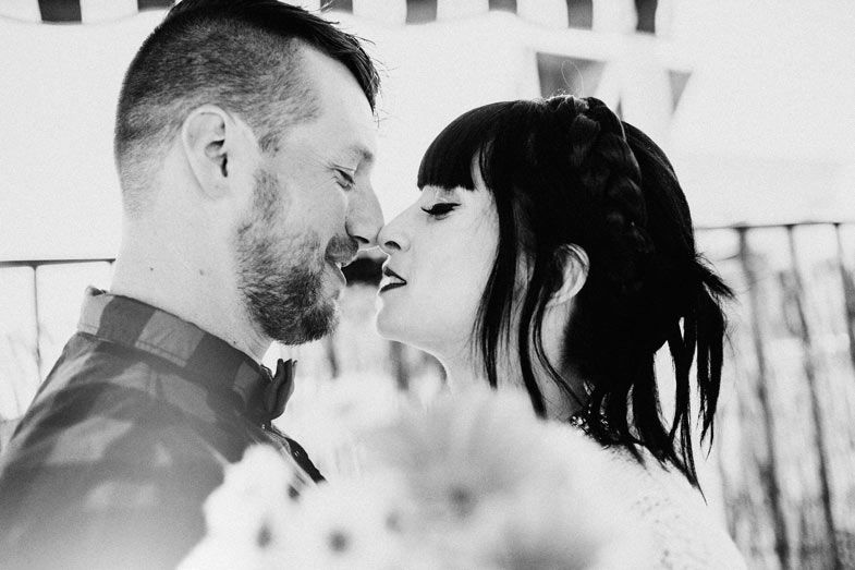 Black and white intimate portrait of a romantic moment between a couple.