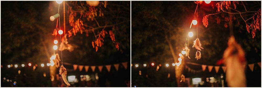 Romantic outdoor evening setting with string lights and glowing lanterns beneath trees.