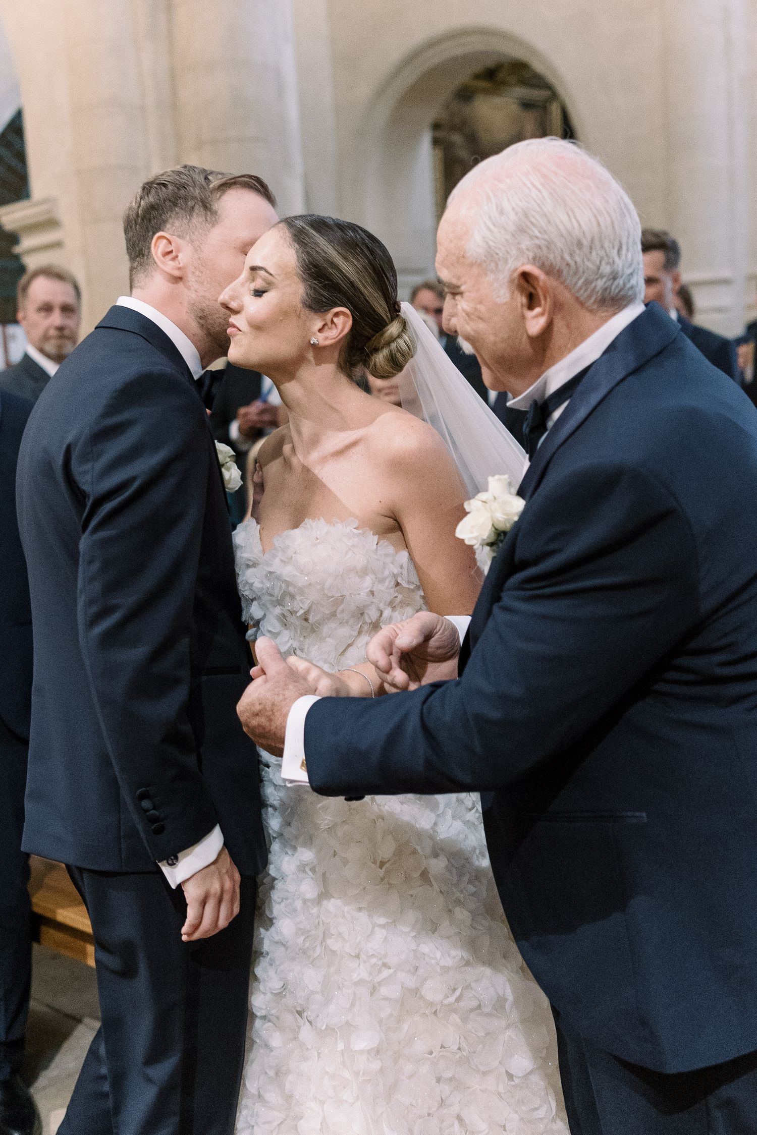 An intimate moment during a traditional church wedding ceremony.
