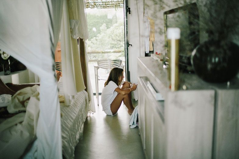 Natural light streaming through window in narrow hallway interior.