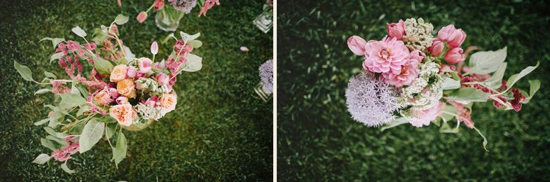 Pink and peach floral bouquets arranged on grass with natural lighting.