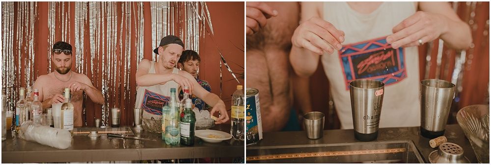 People enjoying drinks at a party with copper and glass barware.