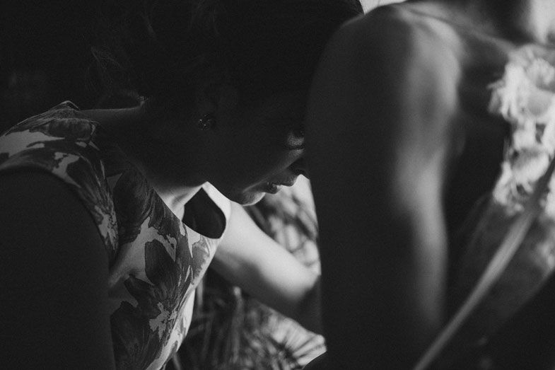 Artistic black and white photo with dramatic lighting and sunglasses.