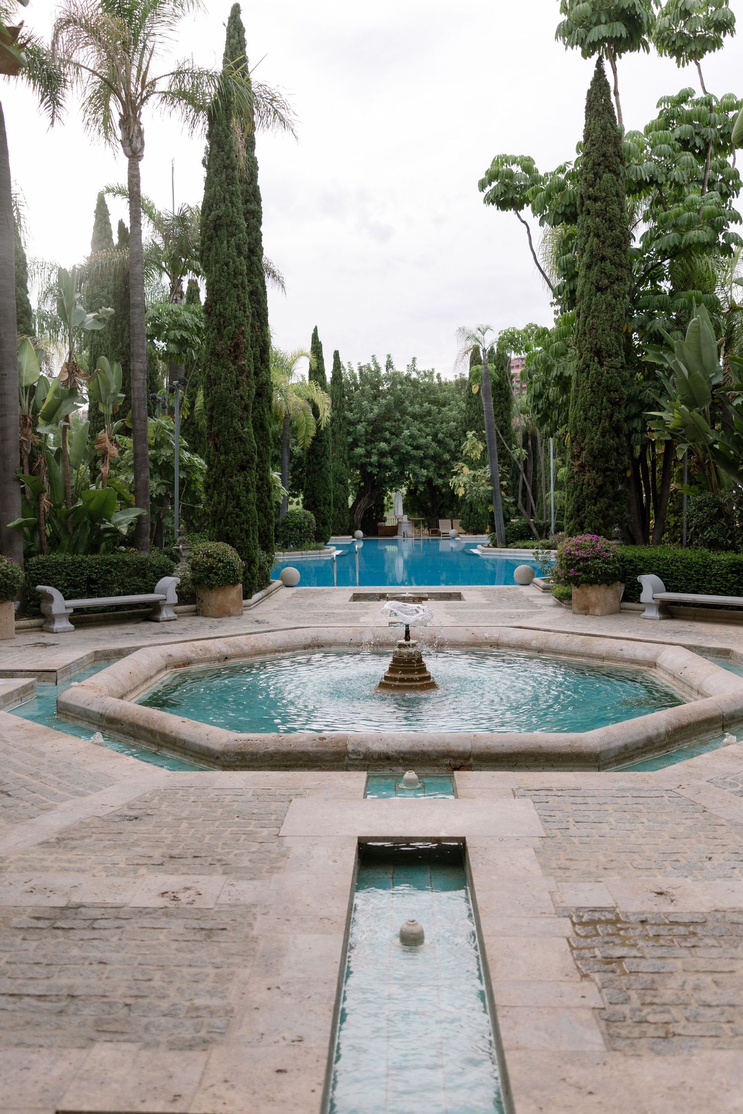 Circular water feature and gardens at Anantara Villa Padierna.
