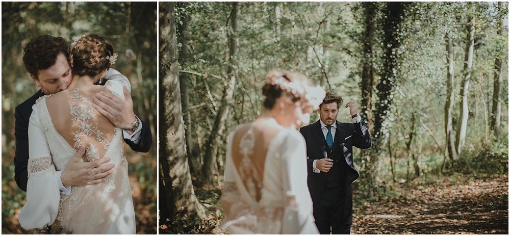 A romantic woodland wedding ceremony between a couple in a sunlit forest setting.