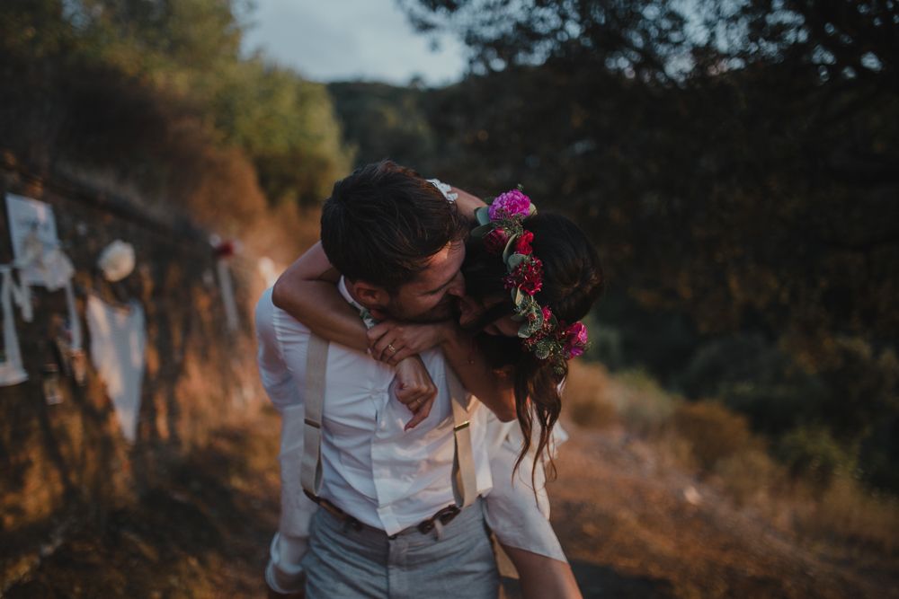 Intimate romantic moment captured during sunset wedding photoshoot.