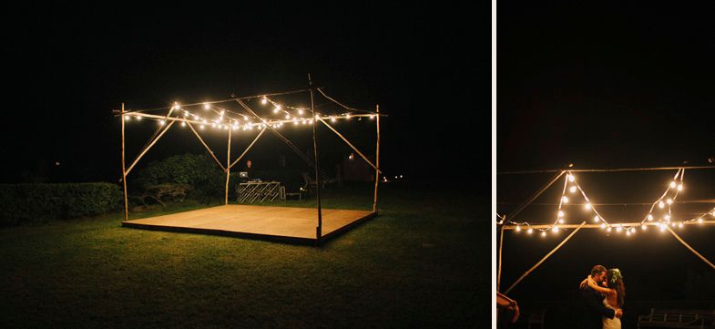 A romantic dance scene under string lights at night in an outdoor venue.