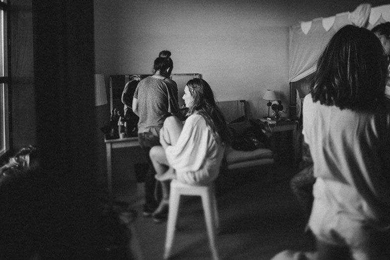 Black and white interior photo showing preparation scene.