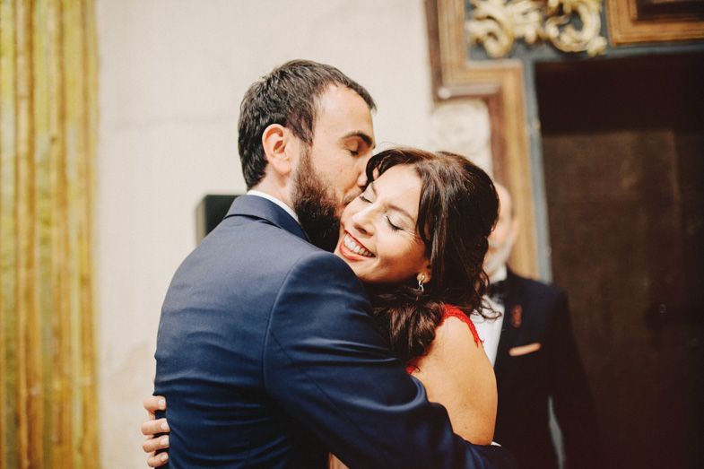 Intimate romantic dance moment between couple at wedding reception.