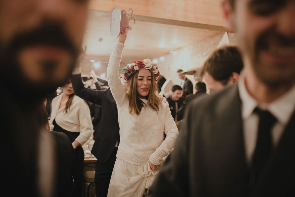 Celebration scene with dancers and party guests in formal attire.