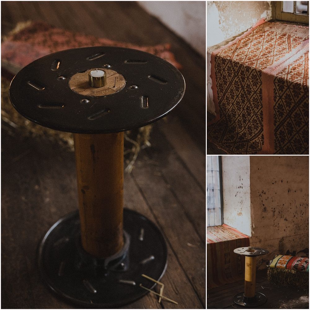 Vintage wooden spool table and textured furniture details in warm lighting.
