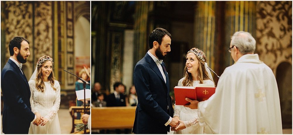 A traditional wedding ceremony taking place in an ornate church with religious officiants.