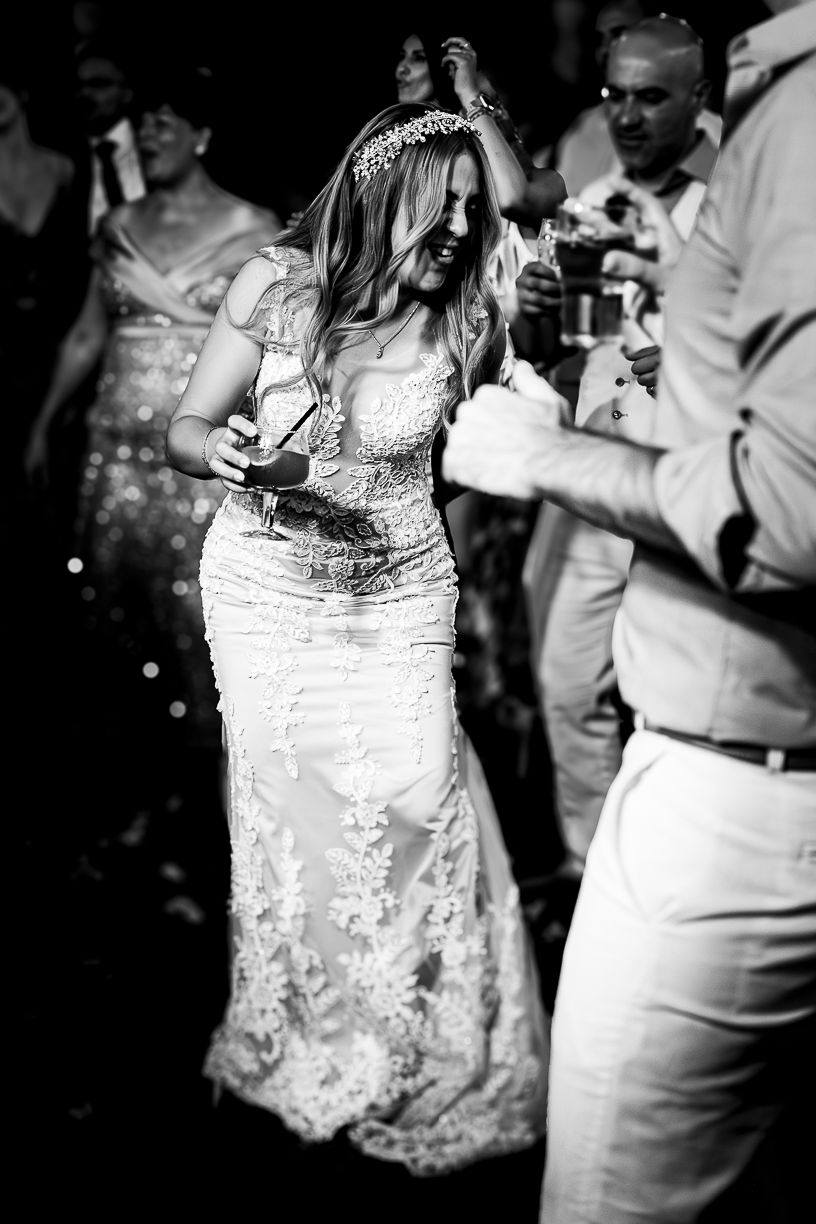 Black and white photograph of elegant formal attire at an evening event.