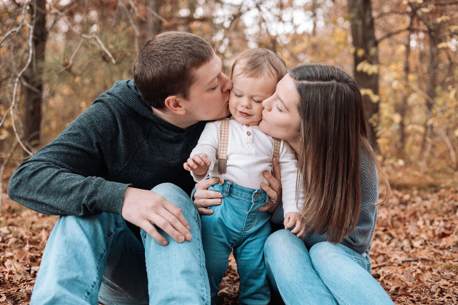 Sweet family moment captured outdoors with playful interactions among loved ones.