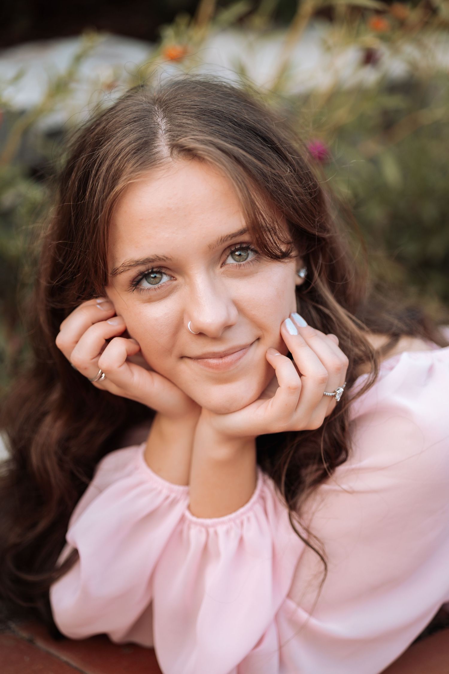 Close-up portrait series showing natural expressions while wearing a pink top with Kenzie Ayla Images in the Twin Cities MN area.