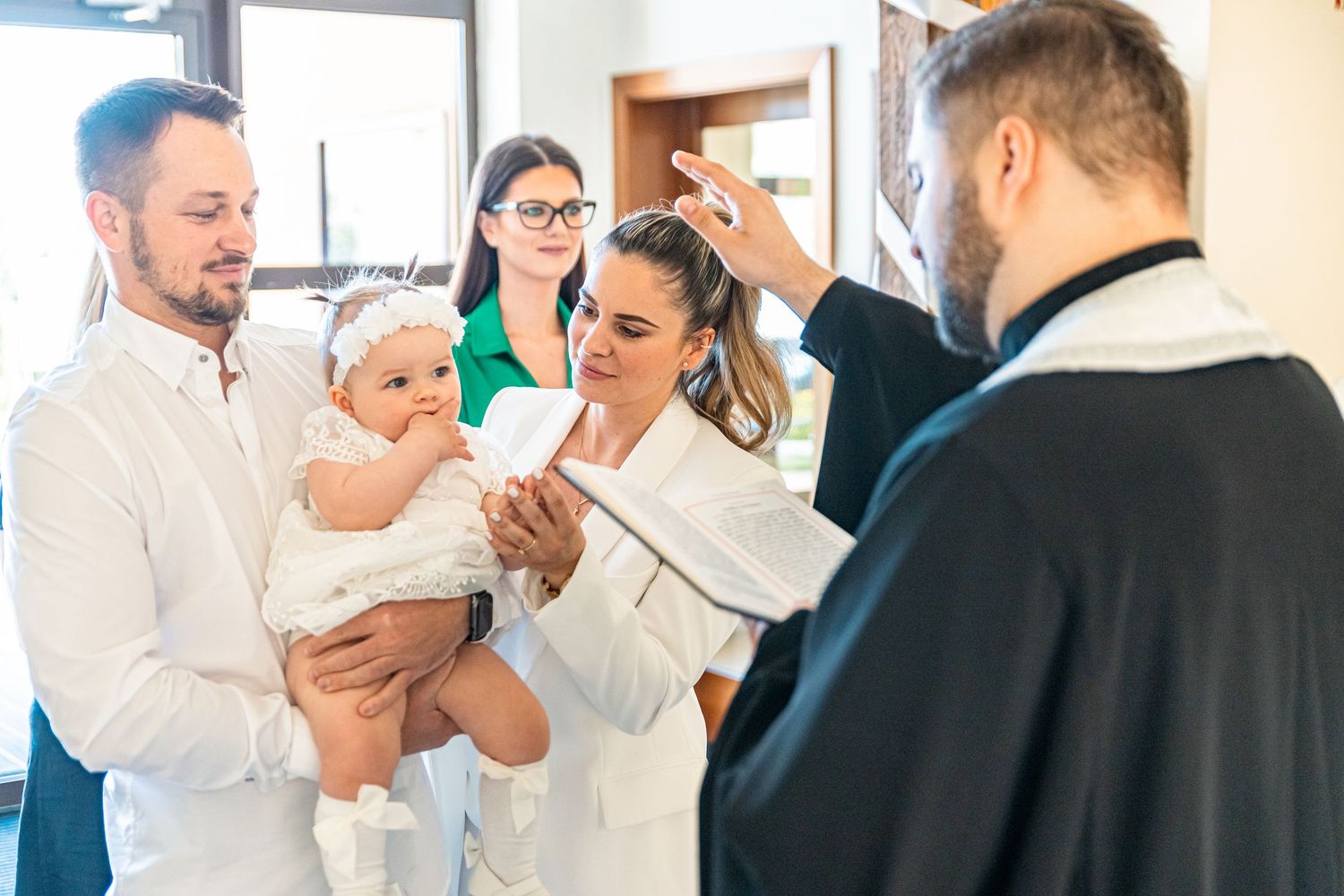 Wedding preparation scene in a bright modern room with white decor and natural lighting.