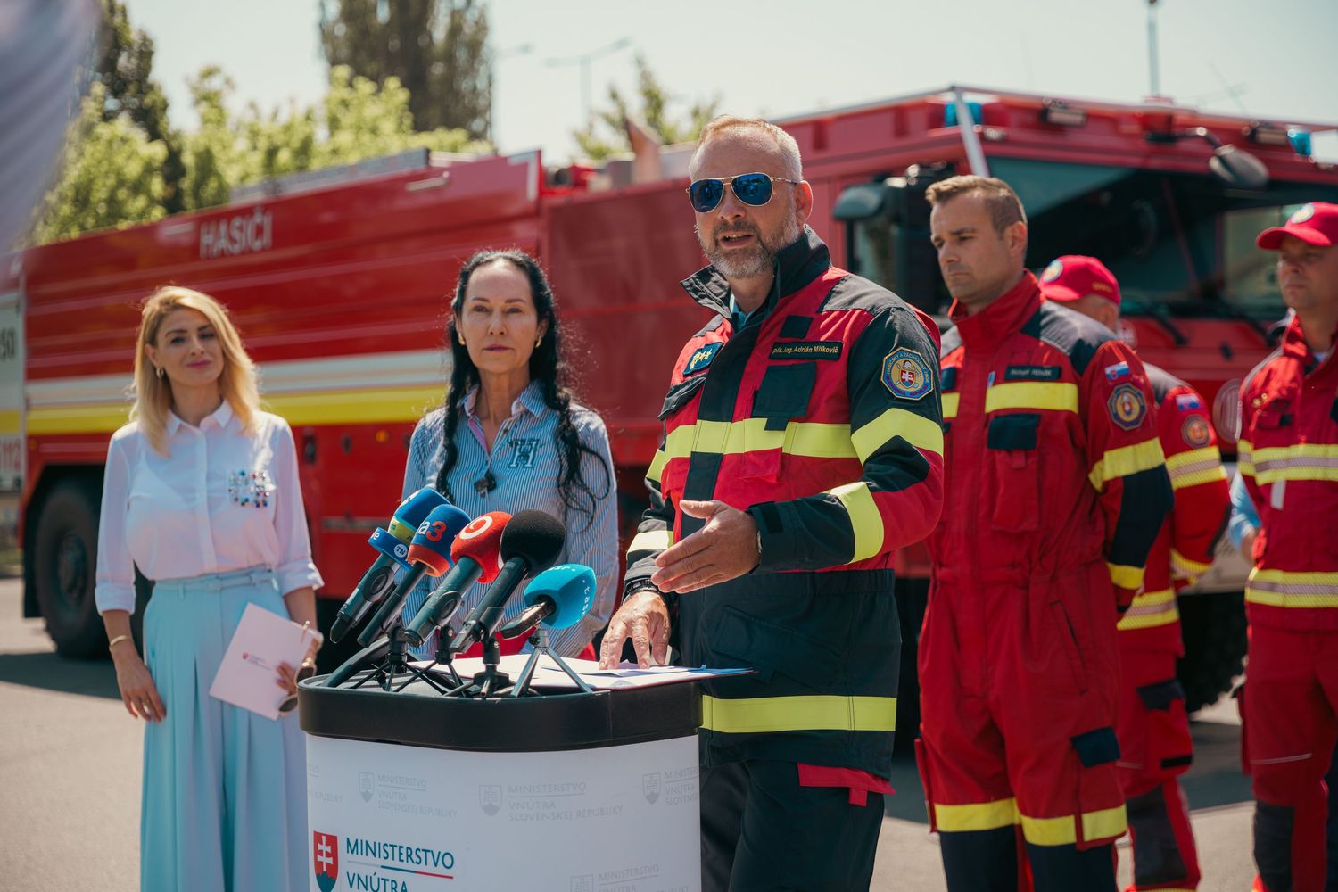 Fire department personnel and equipment displayed during a community outreach event.