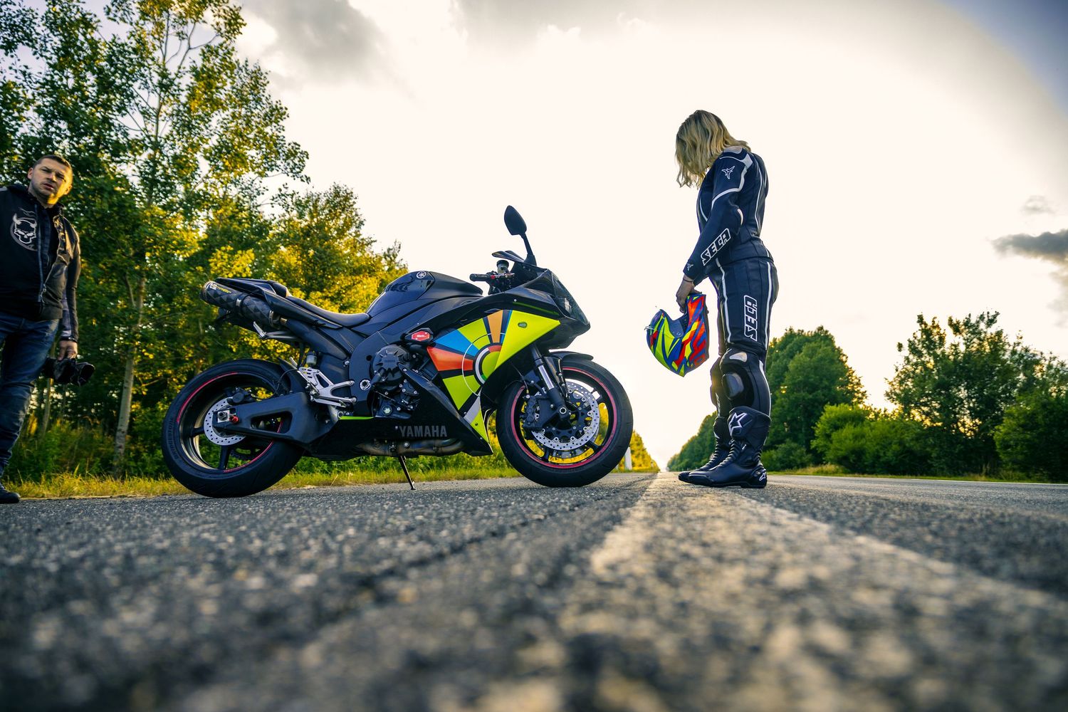 Motorcycle silhouettes against sunset sky in dynamic low-angle shots.