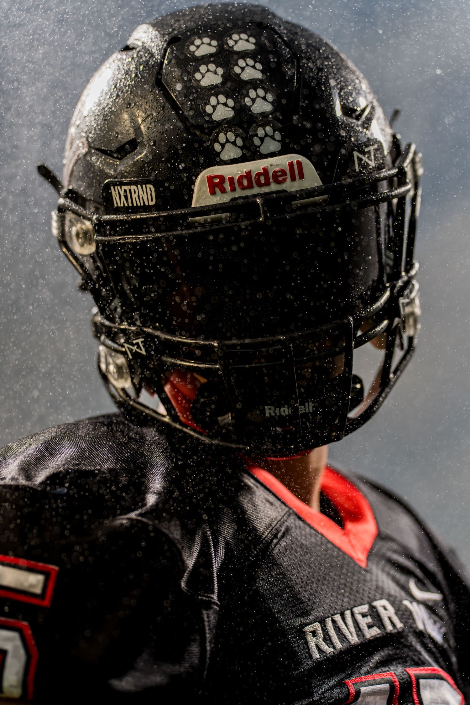 Close-up of black football helmet.
