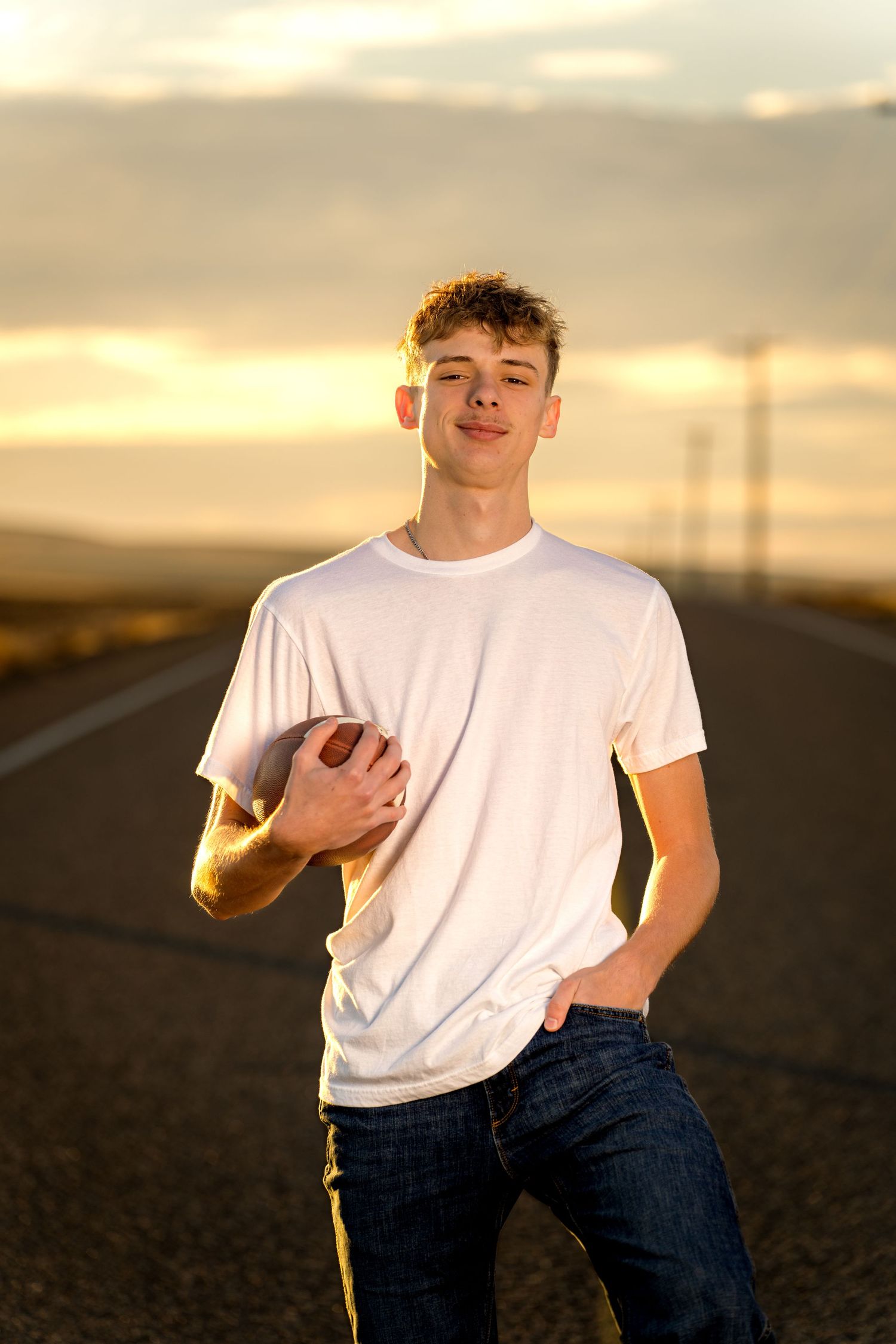 Person in white t-shirt and jeans poses against sunset sky in artistic split-panel composition.