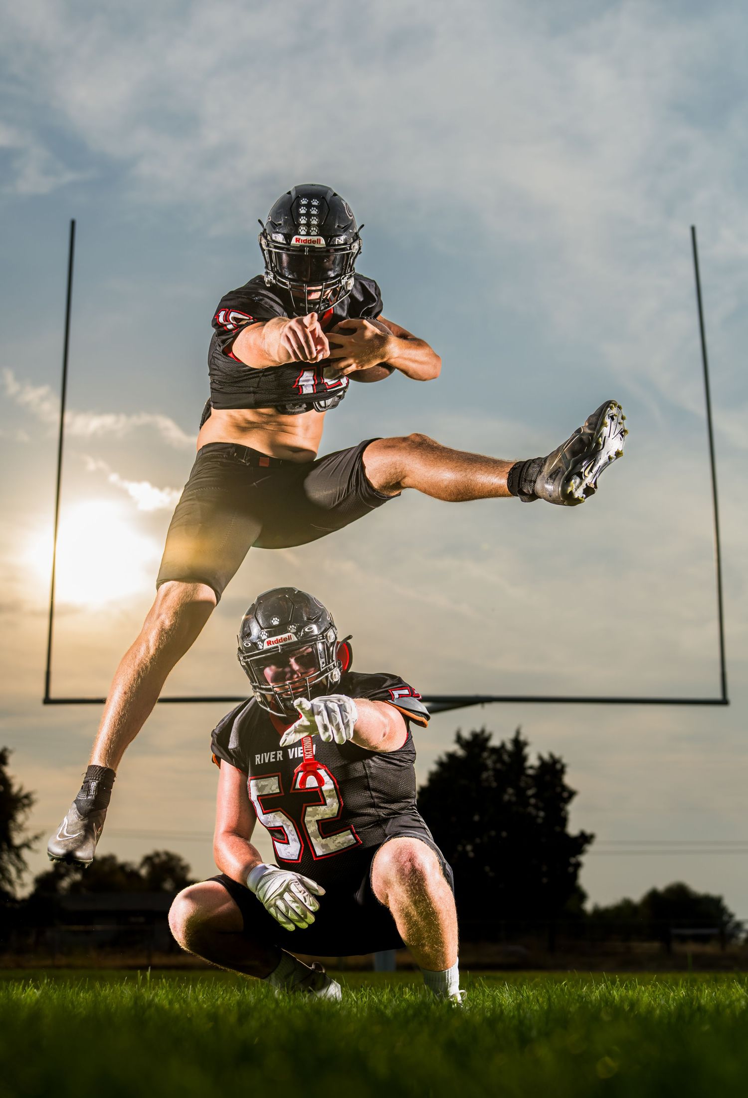 Riverview football players at Media Day in Tri Cities WA with one leaping midair captured by Dillon Lane Photography Eastern Washington.