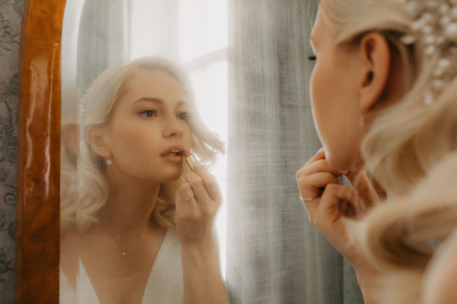 Elegant bride getting ready on wedding morning