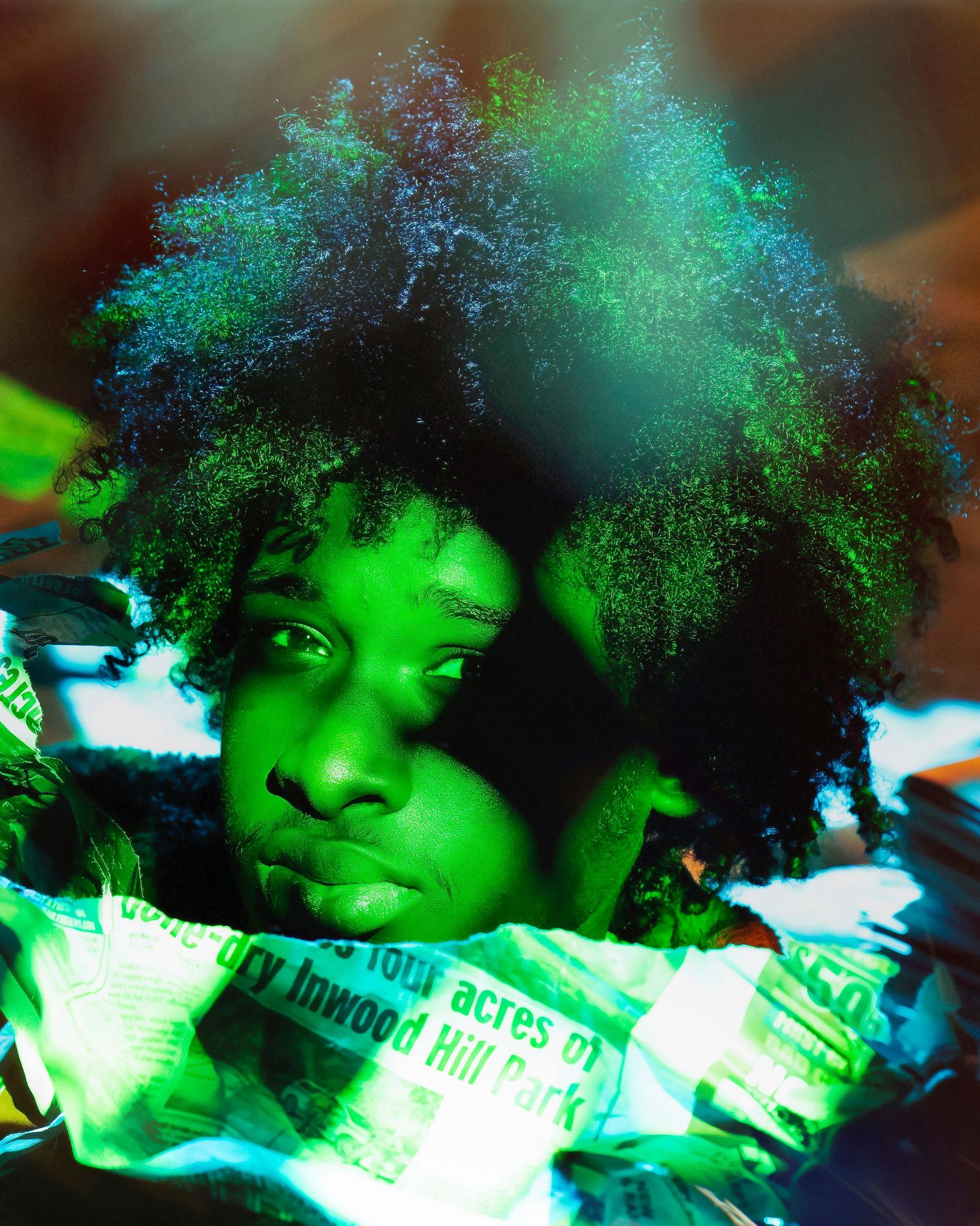 Abstract experimental photography with neon green lighting effects creating a surreal double exposure effect.