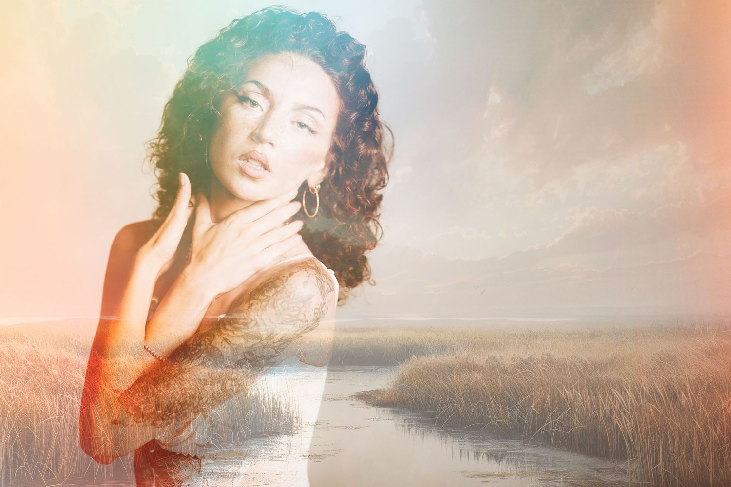 Artistic double exposure portrait blending with a serene marsh landscape at sunset in warm golden tones.