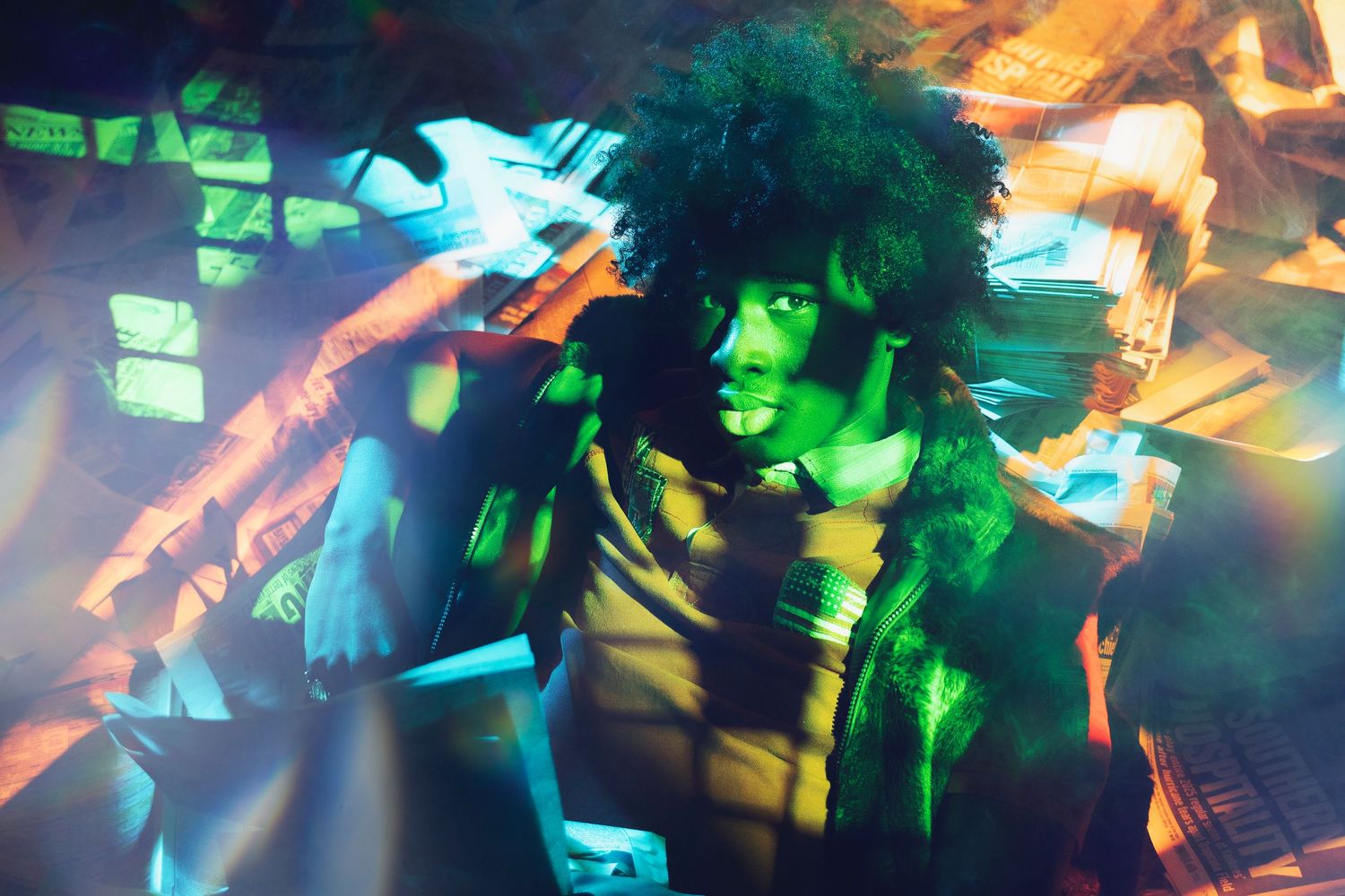 Colorful green and orange lights illuminate a chaotic nightclub dance scene with motion blur effects.