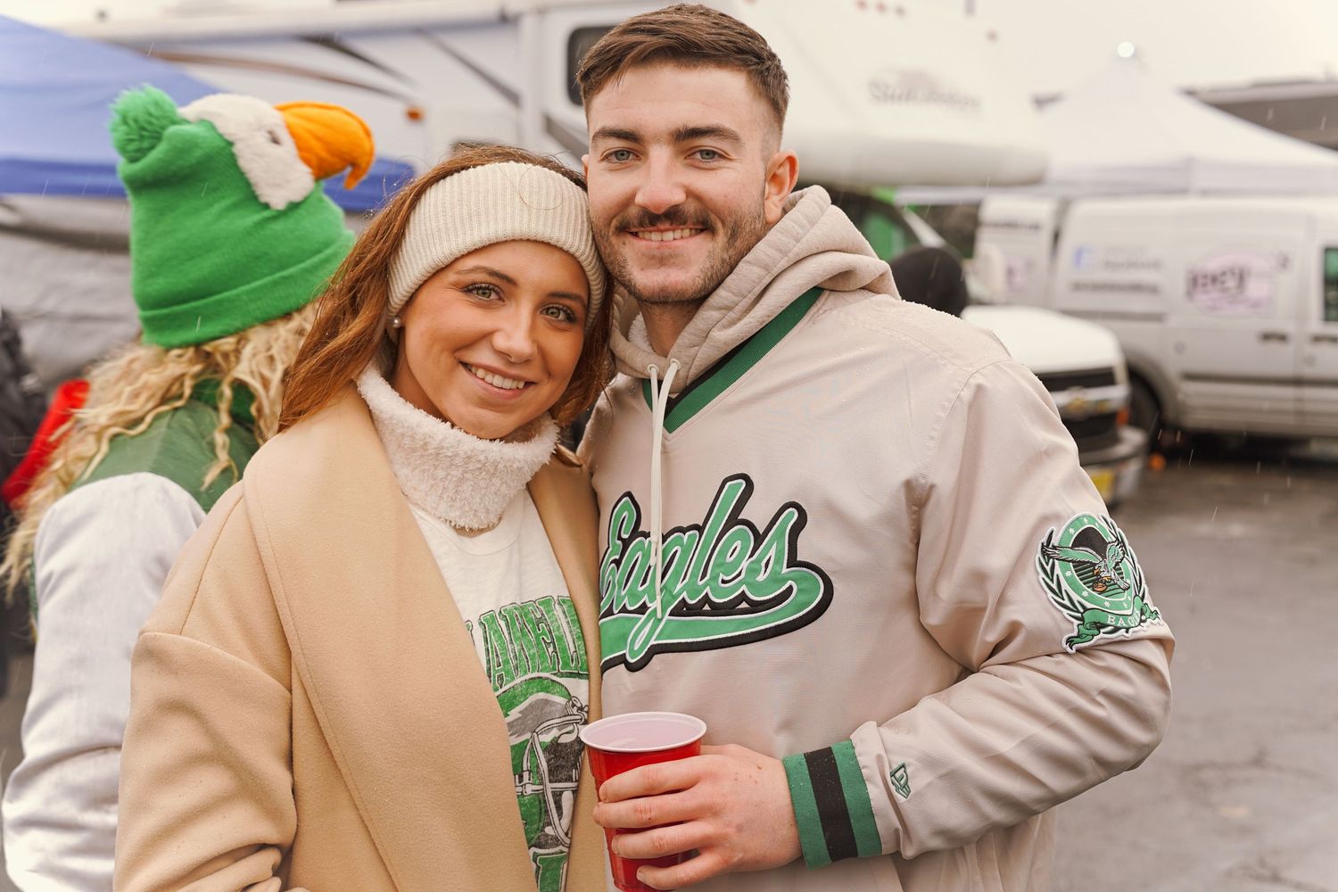 A group of people wearing varsity jackets and casual attire pose together in a series of candid outdoor shots.