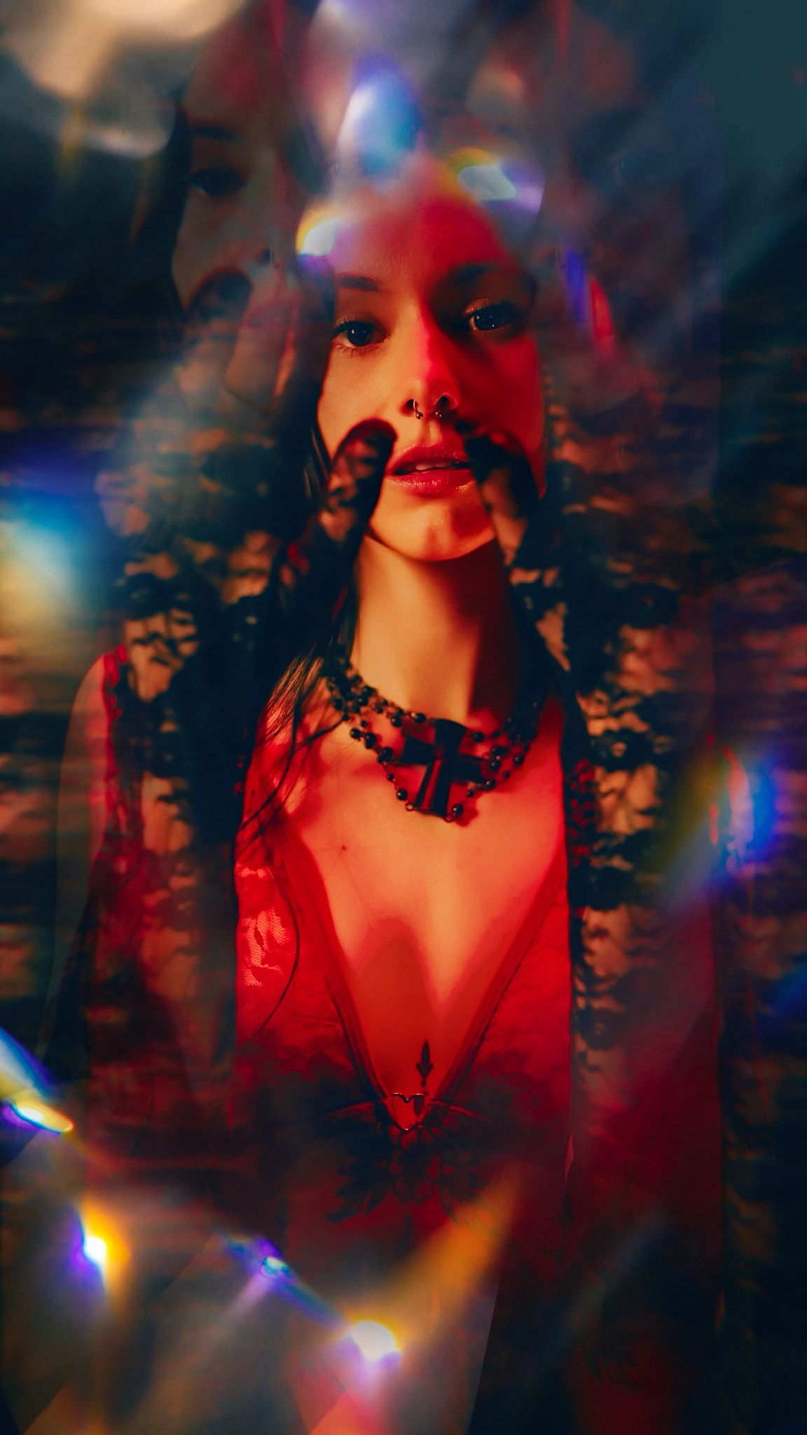 Artistic portrait series with red lighting and prismatic effects creating a dreamy, ethereal atmosphere.