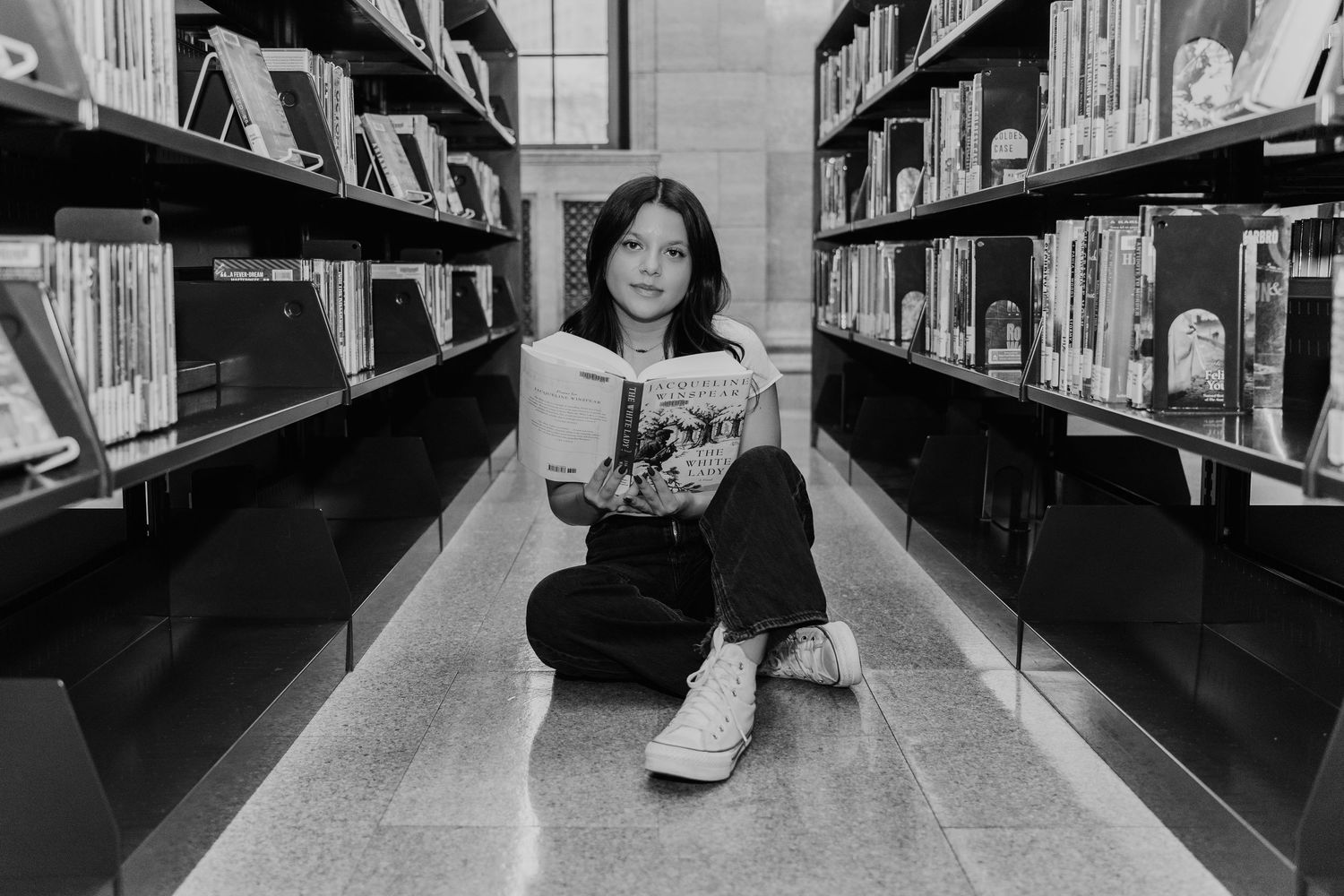 Senior portrait of a high school student in Saint Paul Public Library - George Latimer Central Library, MN by Juve Photography