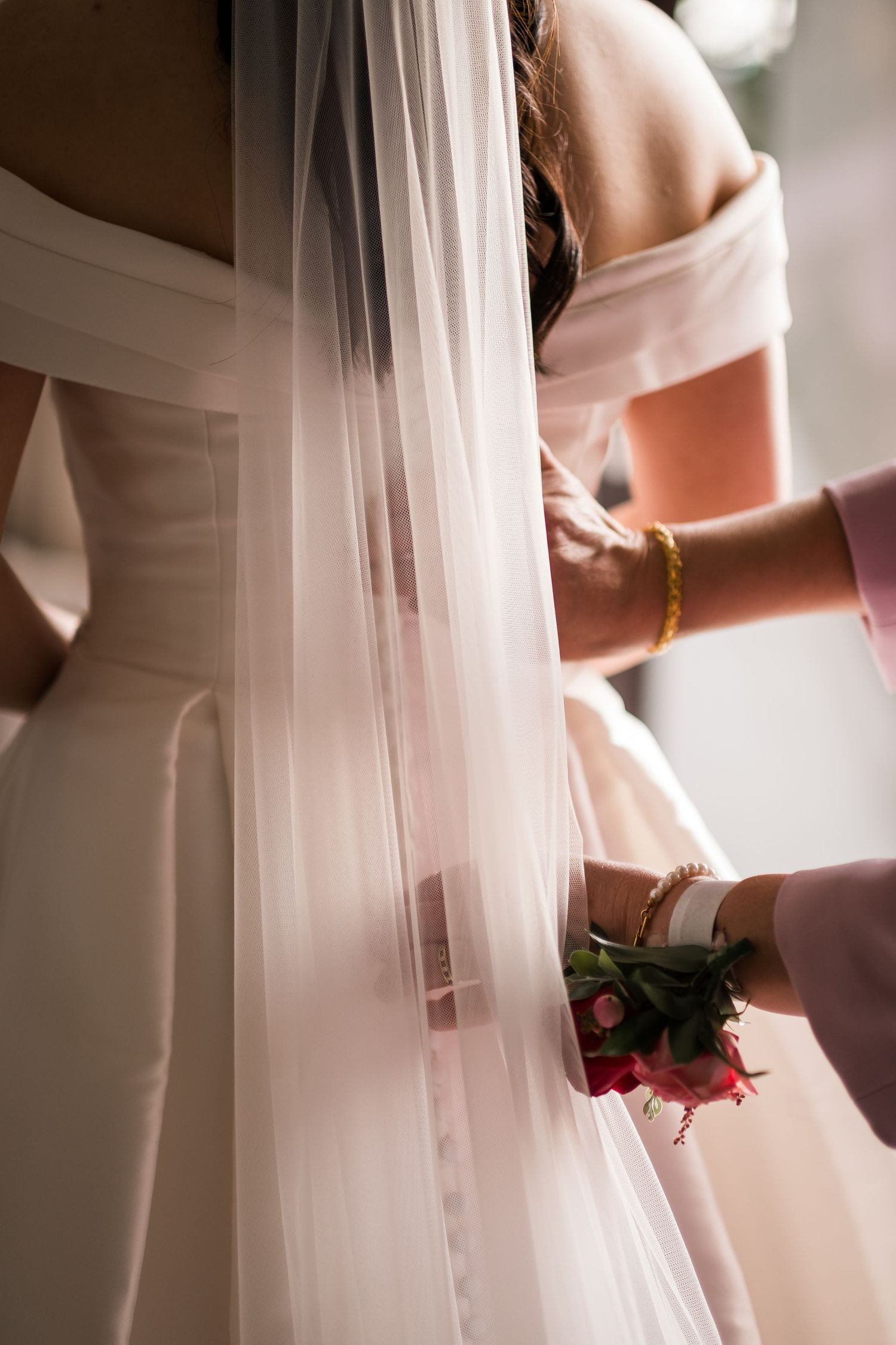 Bride getting ready with her mother on the morning of her Highley Manor wedding.