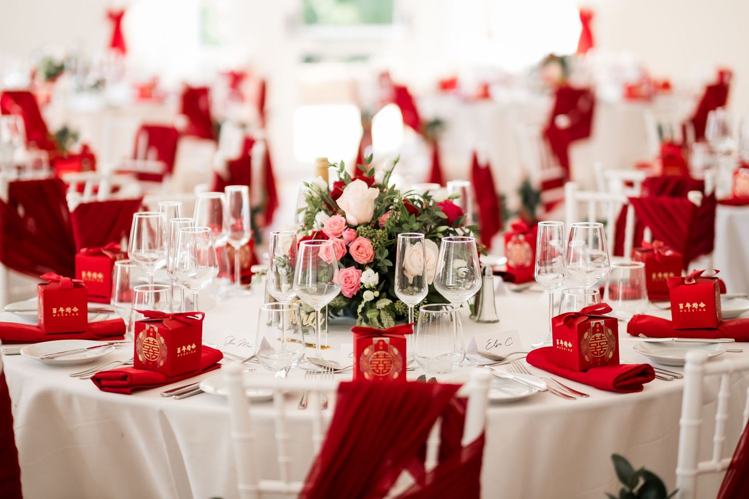 Wedding table styling with Chinese favour boxes at Highley Manor reception.