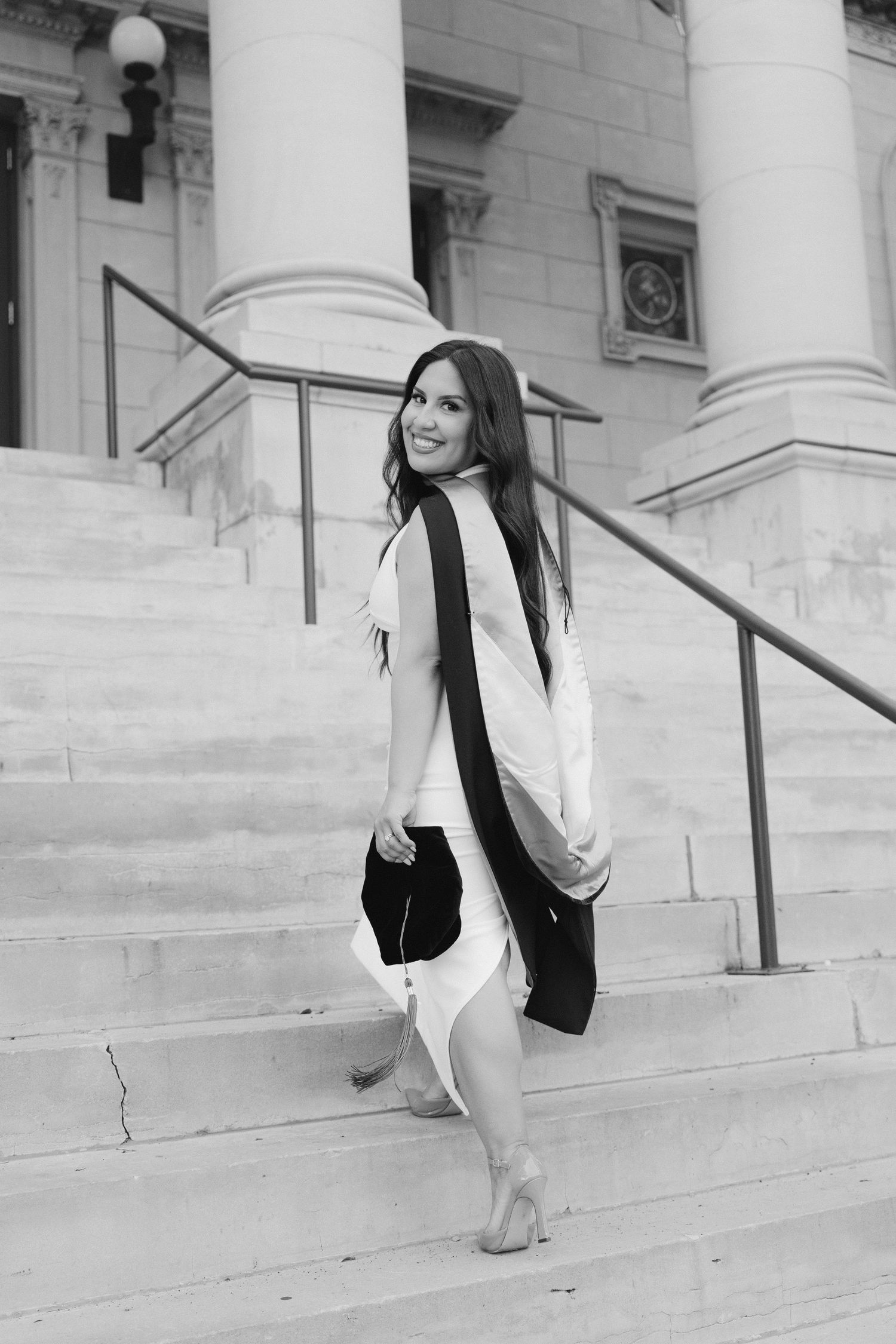 A series of photos showing a person in a white top sitting on light stone steps near classical columns.