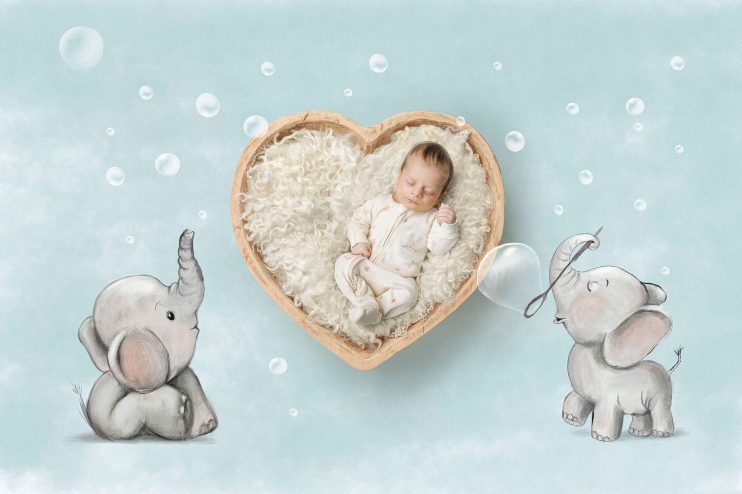Newborn baby sleeping in heart-shaped wooden bowl with two cute cartoon elephants and bubbles on soft blue background.