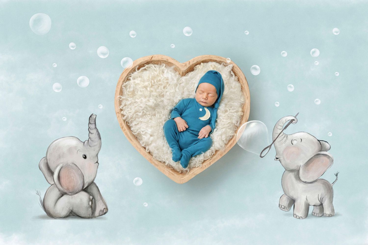 Newborn baby sleeping in heart-shaped wooden bowl with fluffy white lining, flanked by cute cartoon elephants on blue background.
