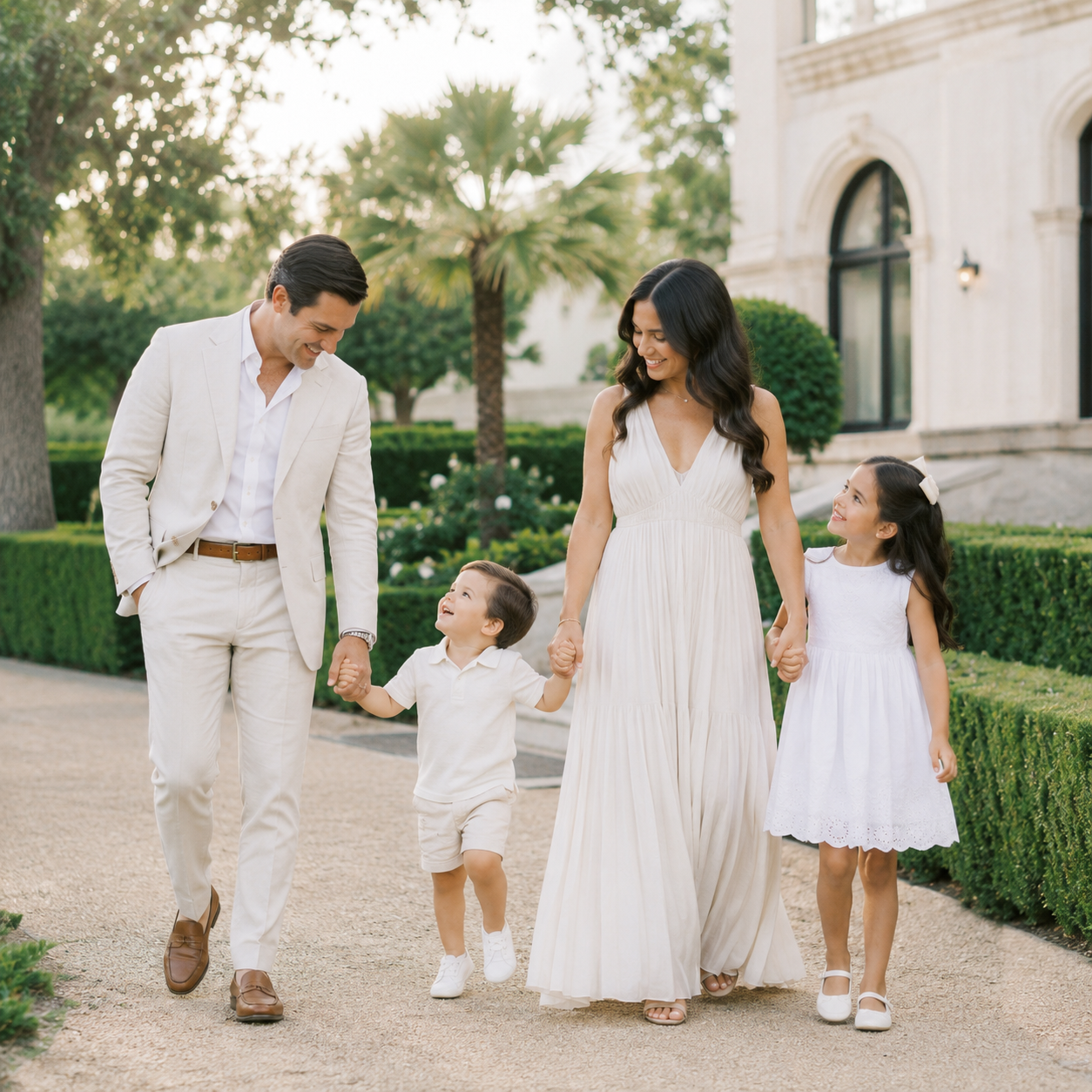Family walking together during a luxury portrait session at Commodore Perry in Austin, Texas.
