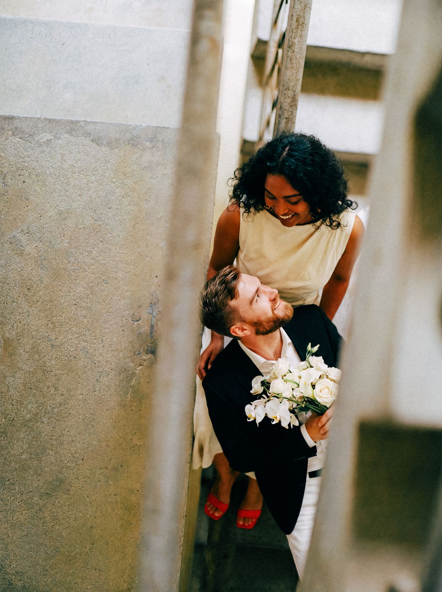Bride holding her bouquet during an intimate New York courthouse wedding.