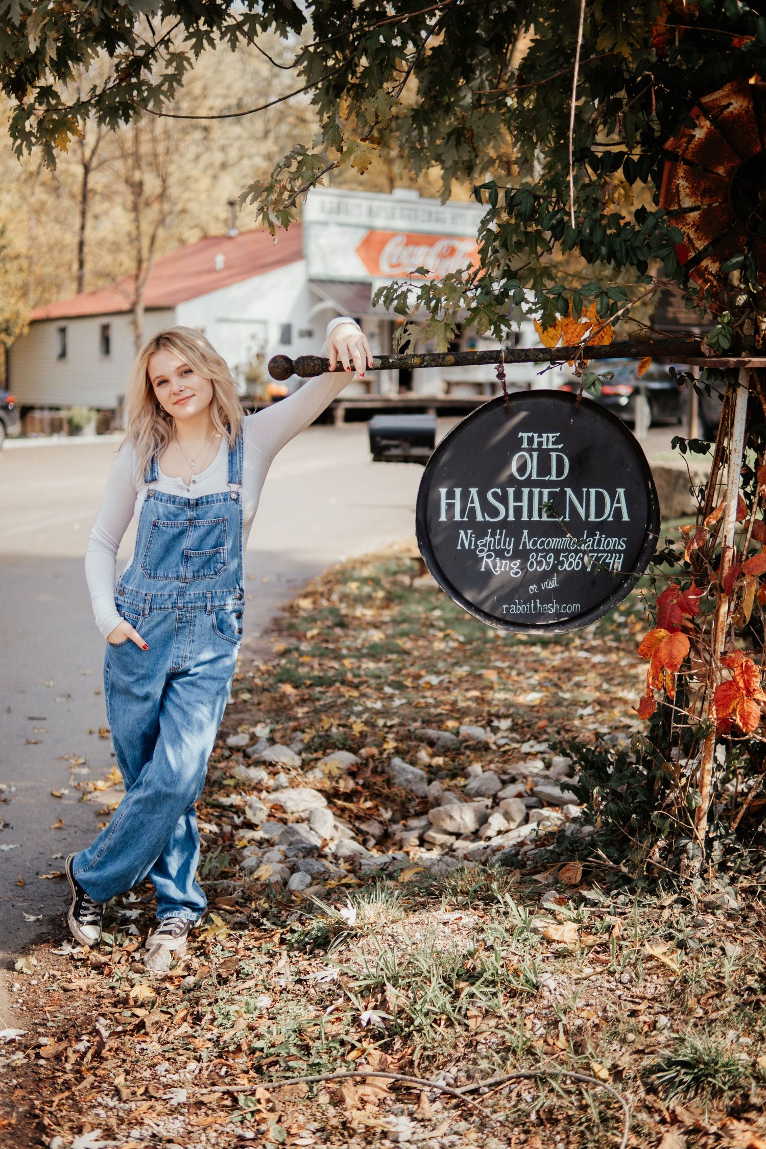 A rustic scene outside The Old Hashienda store with fall foliage.