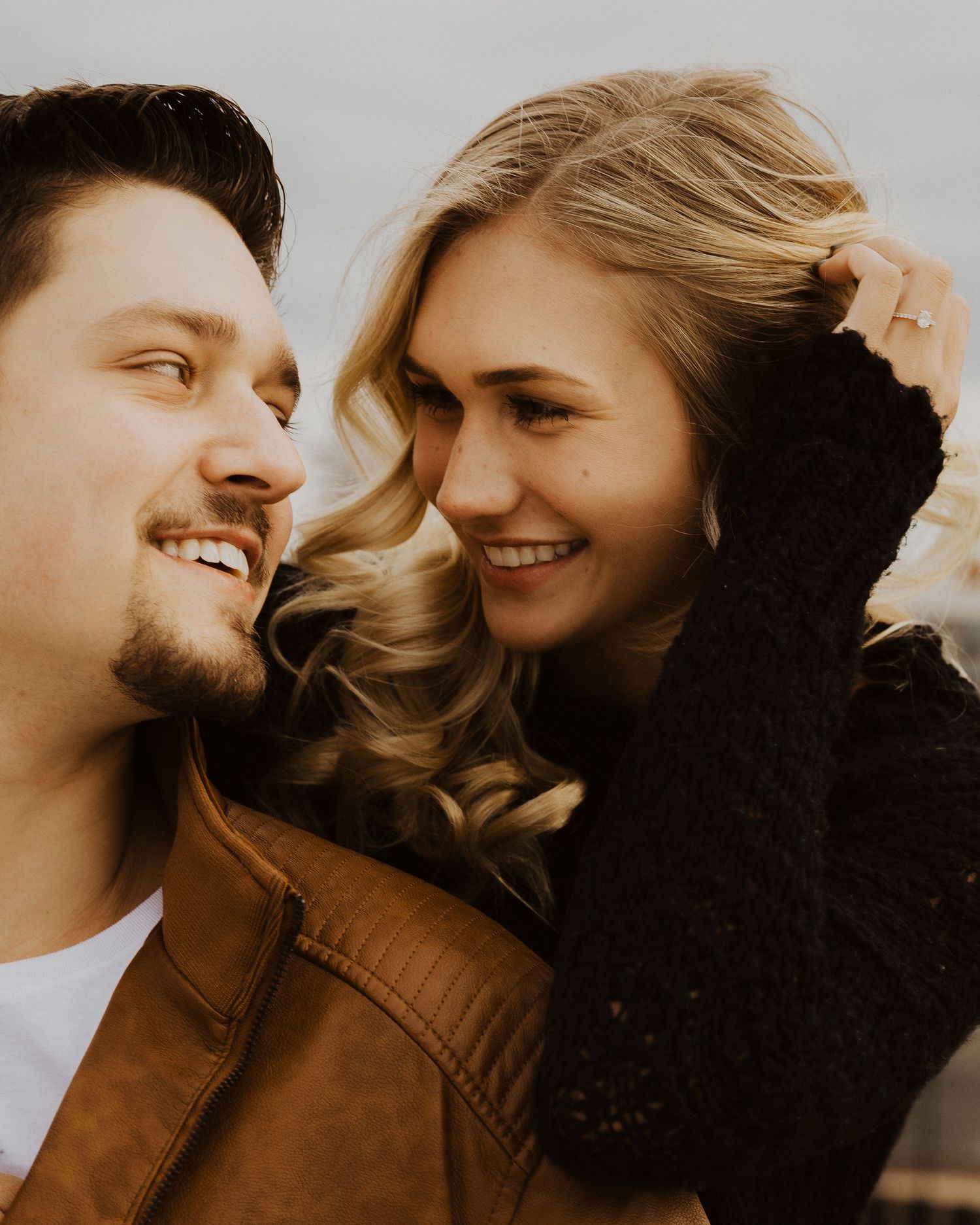 An intimate photo series showing a couple sharing tender moments in golden light.