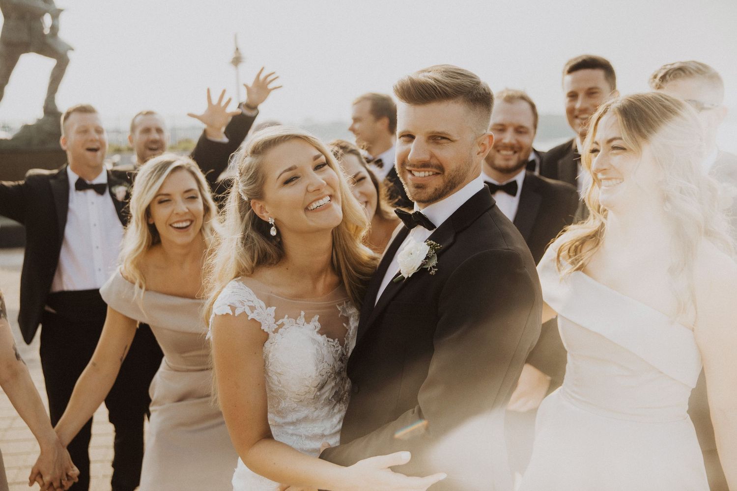 Wedding celebration with guests cheering in warm vintage tones.