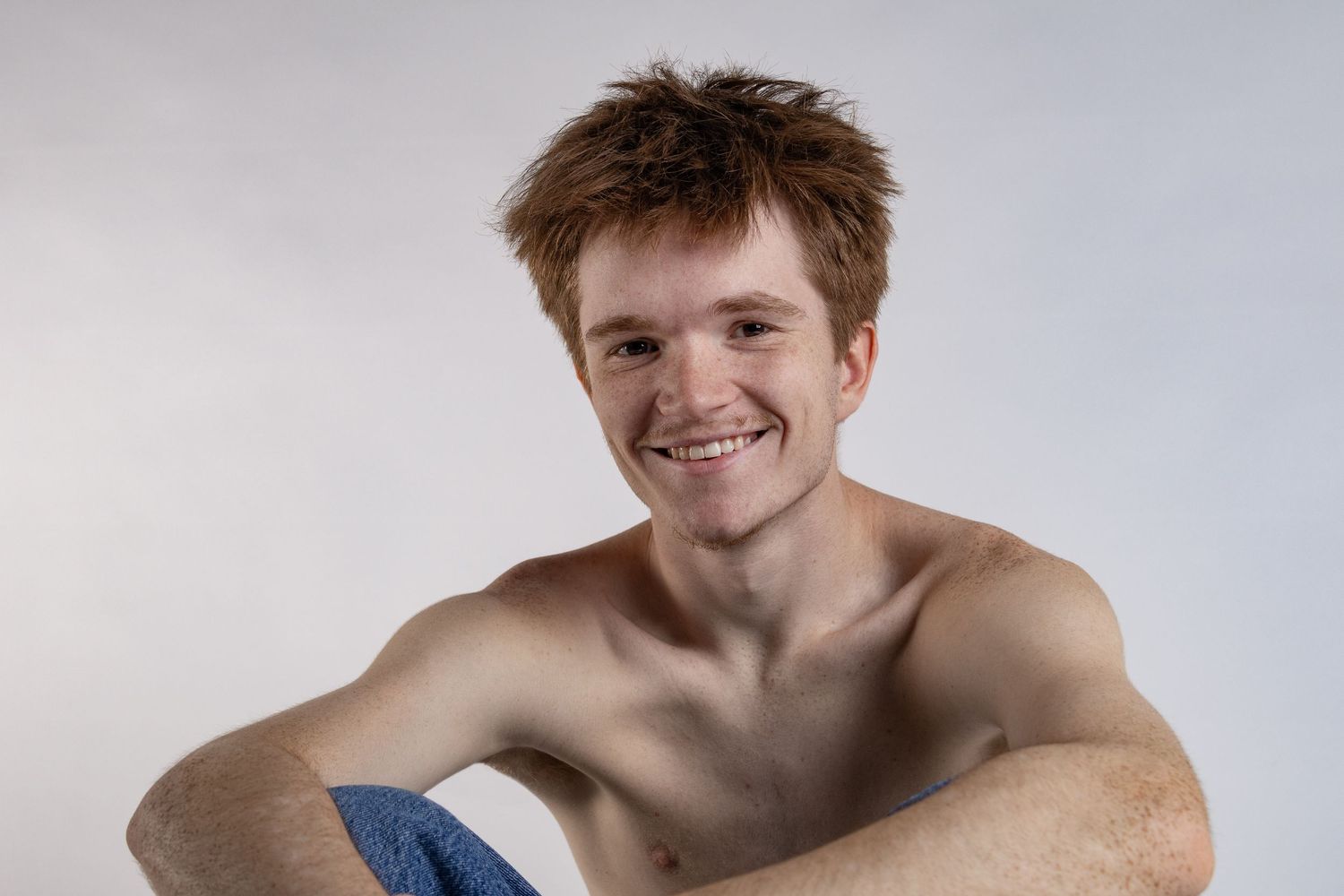 Male model posed in front of white background