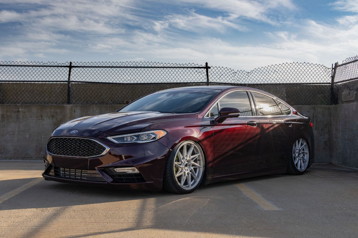 2017 Burgundy Ford Fusion Sport on parking garage roof